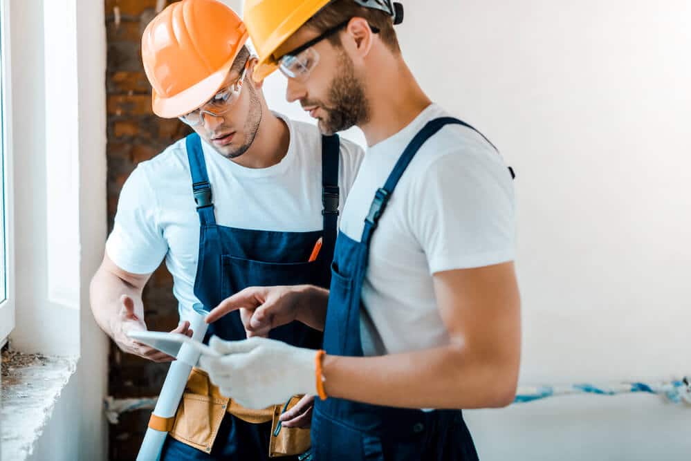 construction workers doing quality checks